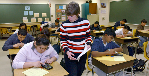 Teacher Susan Oblinger of Centerville High School in Chantilly, Virginia looks over her students during a test in Honors Algebra II. (AP/Stephen J. Boltano)