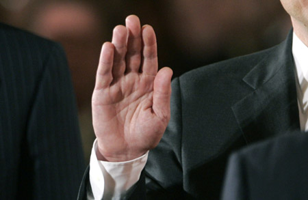 A judge swears in a presidential appointee in the East Room of the White house. (AP/Lawrence Jackson)