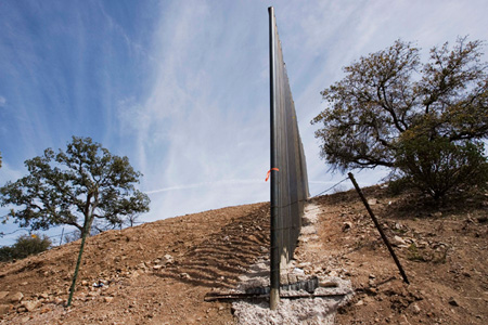 A section of the U.S.-Mexico border fence on the outskirts of Nogales, Mexico. (AP/Guillermo Arias)