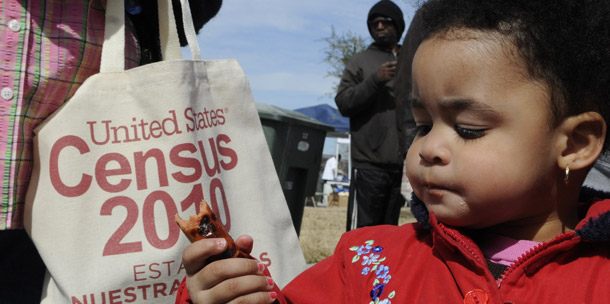 A child eats a hot dog at a community resource event on the 2010 Census in Galveston, TX. The Census Bureau predicts that the nation's Hispanic and Asian populations will triple, and the black population is projected to rise from 35.8 million to 61.4 million. (AP/Pat Sullivan)