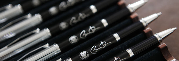 Pens sit, waiting to be used to sign an executive order creating the bipartisan National Commission on Fiscal Responsibility and Reform on February 18, 2010. (AP/Charles Dharapak)