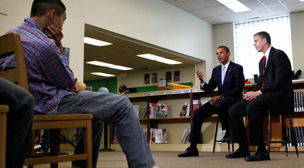 President Barack Obama and Education Secretary Arne Duncan speak to students at Wakefield High School in Arlington, Virginia. (AP/Gerald Herbert)