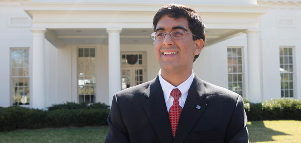 Nitish Lakhanpal, one of the 2009 Intel Science Talent Search finalists, poses in front of the West Wing of the White House. The majority of this year's 40 2010 finalists were children of immigrants. (AP/Charles Dharapak)