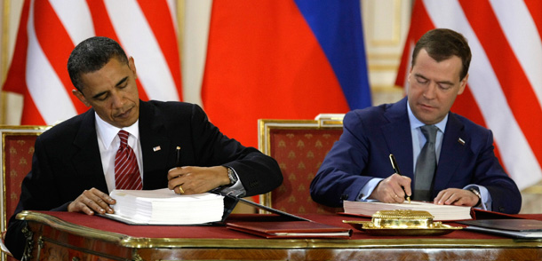U.S. President Barack Obama and his Russian counterpart Dmitri Medvedev sign the New START treaty at the Prague Castle in Prague, Czech Republic on April 8, 2010. (Ap/Mikhail Metzel)