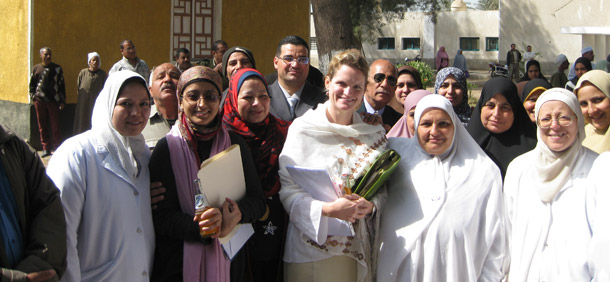 Afeefa Syeed (second from left), Senior Culture and Development Advisor, USAID, is seen at a USAID-funded health clinic in Cairo, Egypt with the nurses and midwives who serve at the clinic. (USAID)