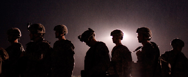 Soldiers wait to board a plane to Afghanistan from Fort Campbell Army Base. (AP/Josh Anderson)
