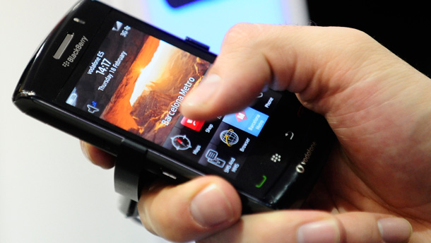 A BlackBerry Storm2 smartphone is displayed at the Mobile World congress in Barcelona, Spain on February 2010. Federal IT programs will be under more pressure to reduce costs by moving away from expensive IT projects and onto smarter technology while protecting citizen's information. (AP /Manu Fernandez)