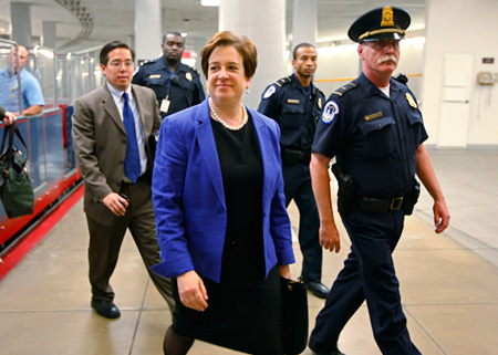 Supreme Court nominee Elena Kagan has a protective escort as she makes the rounds with Senate leaders and Judiciary Committee members on Capitol Hill in Washington. (AP/J. Scott Applewhite)