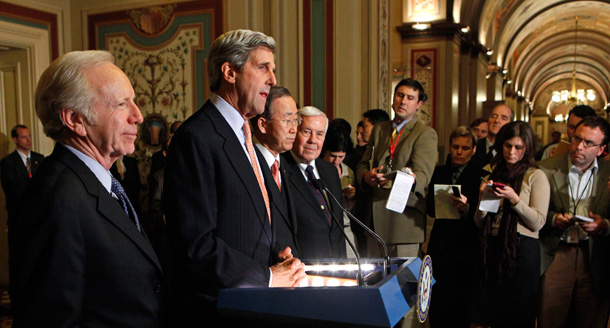 Sens. John Kerry (D-MA) and Joe Lieberman (I-CT) discuss clean energy legislation at a press coference on Capitol Hill last year with U.N. Secretary-General Ban Ki-moon. (AP/Haraz N. Ghanbari)
