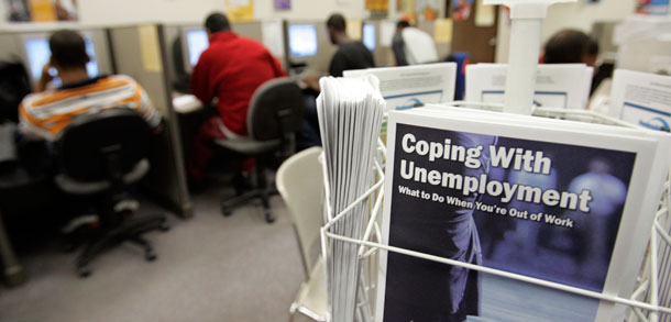 Unemployment brochures seen on display at a California employment training facility. (AP/Paul Sakuma)