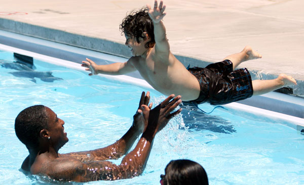 New policies addressing the needs of low-income families can help many families have a more joyous Father's Day. (AP/Lindsay Pierce)