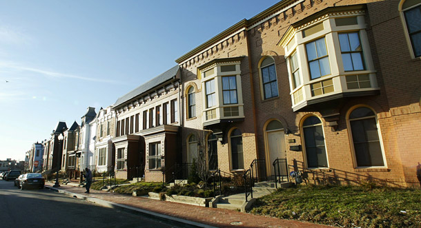 Newly built and rebuilt houses line U Street in northwest Washington, D.C. Pending legislation would capitalize the National Housing Trust Fund, which is designed to build, preserve, and rehabilitate affordable housing. This would help fix a pre-existing problem of housing for low-income families that the recession has only exacerbated. (AP/Manuel Balce Ceneta)