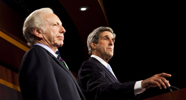 Sen. Joseph Lieberman, (I-CT), left, and Sen. John Kerry, (D-MA), take part in a news conference on Capitol Hill on June 15, 2010, to announce the results of the Environmental Protection Agency's economic analysis of their American Power Act. (AP/Drew Angerer)