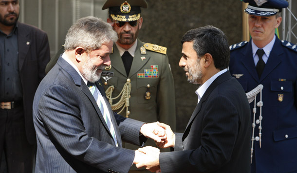 Iran's President Mahmoud Ahmadinejad, right, welcomes Brazil's President Luiz Inacio Lula da Silva during an official welcoming ceremony in Tehran on May 16, 2010. Brazil and Turkey both voted against a United Nations Security Council measure two weeks ago to enhance sanctions on Iran. (AP/Vahid Salemi)