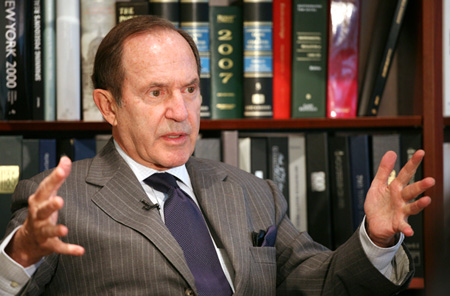 Mortimer Zuckerman—the real estate billionaire who owns <i>U.S News and World Report</i>—gives an interview at his Boston Properties office in New York. (AP/Mark Lennihan)
