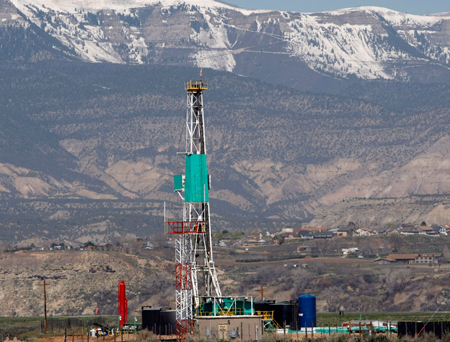 Wyoming ranks first in coal production among U.S. states, second in natural gas, and fourth in oil. Taxes and royalties from oil and gas pump nearly $3 billion a year into local and state government coffers, almost $5,500 for every man, woman and child in the Cowboy State. (AP/David Zalubowski)