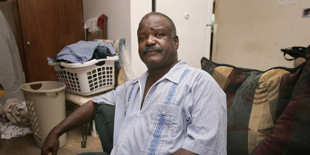 An unemployed construction worker poses in a garage apartment belonging to a friend in Little Rock, AR. A new U.S. Centers for Disease Control and Prevention study found that poverty may be the most important risk factor for HIV infection among heterosexuals living in urban areas. (AP/Danny Johnston)