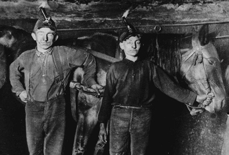 Two young boys work in a coal mine in this 1908 photo. If the "tenthers" had their way, the Supreme Court would be able to rule important protections from the past 100 years such as child labor and mine safety laws unconstitutional. (AP)