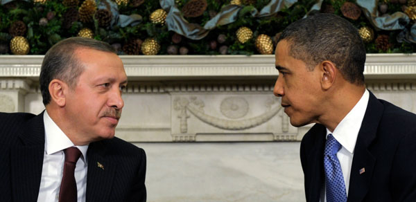 Turkish Prime Minister Recep Tayyip Erdogan seated with President Barack Obama at the White House.  Eighty-seven senators have signed a letter calling on the Obama administration to put İHH  on a list of foreign terrorist organizations which is counterproductive to U.S. efforts to recognize and respond to terrorist threats. (AP/Susan Walsh)