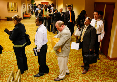Job seekers wait in line to register and attend a National Career Fair in San Francisco on June 28, 2010. (AP/Eric Risberg)
