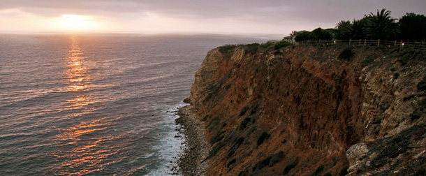 The sun sets at the Point Vicente Park on the Pacific Ocean in Palos Verdes, California—an area where the EPA has spent millions to clean up decades of DDT deposits spilled illegally into the sewers and out into the ocean. (AP/Damian Dovarganes)