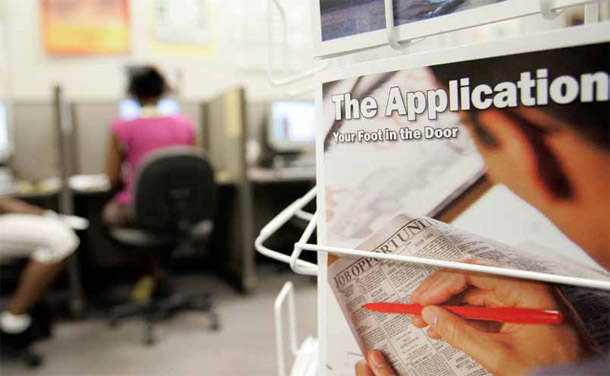 A rack of job-seeking materials is seen at a career center. Women are particularly short-changed by the WIA system, which helps U.S. workers find jobs and get training. A number of reforms to the system could help it better serve women. (AP/Paul Sakuma)