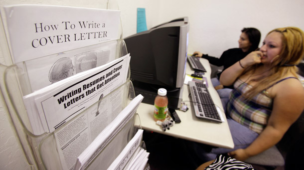 Two women learn to write a resume during a class at JobTrain, an educational and training institution that also offers career counseling and job placement services in Menlo Park, California. (AP/Paul Sakuma)