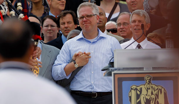 Glenn Beck holds hands with faith leaders at his "Restoring Honor" rally on the National Mall on Saturday, August 28, 2010. At the rally, Beck made sure to make it clear that the Tea Party is a religious movement.  (AP/ Alex Brandon)