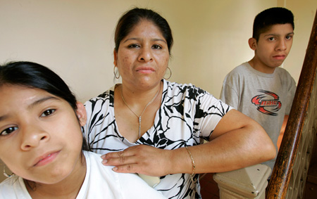 Maria Romano originally immigrated to the United States illegally, but all three of her children have lived their entire lives in this country. Repealing the 14th amendment would throw their citizenship status into question. (AP/Gregory Bull)