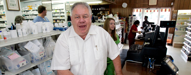 Waymon Tigrett, pictured here, reports that Medicaid financing has real implications for some of his customers in Mississippi—and for his family store and pharmacy. (AP/Rogelio V. Solis)