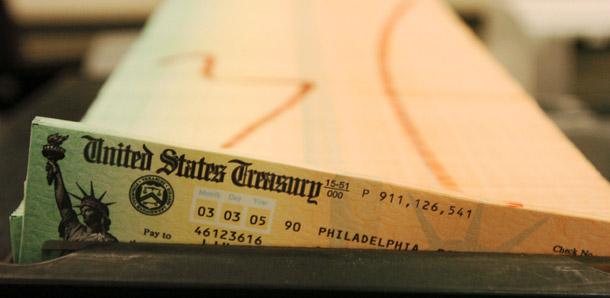 Trays of printed Social Security checks wait to be mailed from the U.S. Treasury's Financial Management services facility in Philadelphia. Social Security continues to be a reliable and critical source of income for many Americans after 75 years. (AP/Bradley C Bower)