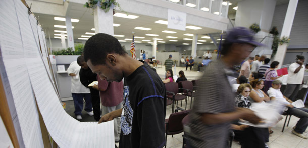 Job seekers check listings on a job board at the Nevada JobConnect Career Center on September 1, 2010 in Las Vegas. (AP/Julie Jacobson)