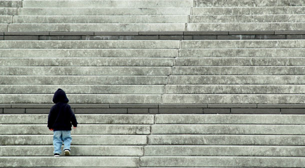 Children who grow up poor in America end up worse off as  adults than those who do not grow up poor along a variety of dimensions, including poorer health, lower education, and lower earnings. (iStockphoto)