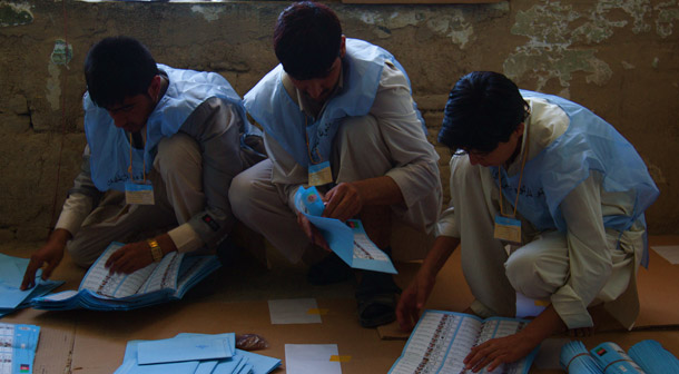 Afghans count ballots in Mazar-i-Sharif in Balkh province.<br /> (Heidi Carrubba)