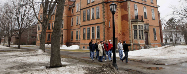 Prospective students and their parents tour the campus of Bowdoin College in Brunswick, Maine. The federal government can encourage students to pursue high-quality, lower-cost education by giving them the tools to make good consumer choices. (AP/Robert F. Bukaty)
