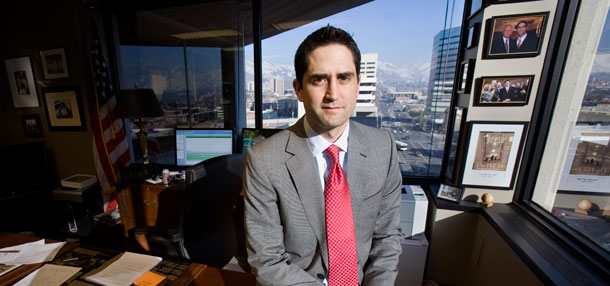 Brett Tolman, pictured here, is a federal prosecutor in Utah. Federal workers on average not only are better educated than those in the private sector, but are also more experienced and older. This helps explain the compensation gap that appears when looking at unadjusted wages. (AP/Douglas C. Pizac)