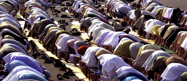 Muslims pray during Eid-al-Fitr to mark the end of the month of Ramadan on Red Road in Calcutta, India. A Pew poll released in August shows that 55 percent of Americans “do not know very much” about Islam while 25 percent “know nothing at all.” Despite this lack of knowledge 38 percent of Americans have an “unfavorable” view of Islam and 35 percent believe that Islam “is more likely to encourage violence than other [religions].” (AP/Bikas Das)