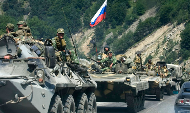 Russian heavy armoured vehicles in the Ardon Valley, Russia, heading towards the Georgian border and South Ossetia on Saturday, Aug. 9, 2008. (AP/Mikhail Metzel)