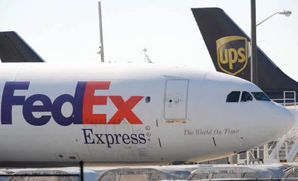 FedEx and UPS cargo planes sit on the tarmac of the north cargo terminal area at Hartsfield-Jackson Atlanta International Airport on October 30, 2010 in Atlanta. Last week's attempted bombing using packages sent through FedEx and UPS highlight continuing vulnerabilities in air cargo security. (AP/Erik S. Lesser)
