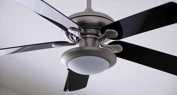 Many ceiling fans come with a switch that changes the blades’ direction.  In a counterclockwise direction the blades will produce cool breezes.  When going clockwise, however, they produce warm air. (iStockphoto)