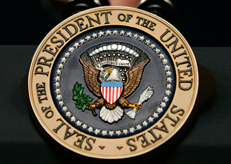 A podium bears the seal of the President of the United States. (AP/J. Scott Applewhite)