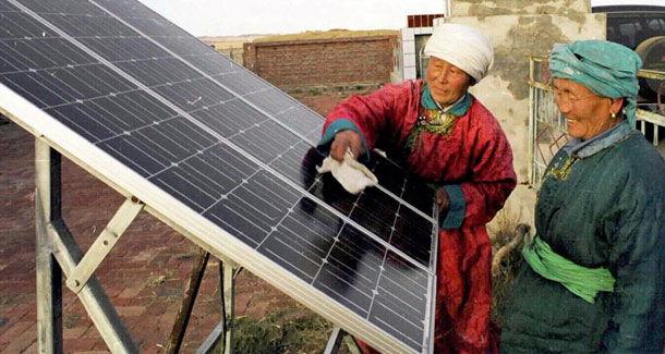 Governments can use policy measures alongside relatively small sums of public money to catalyze private sector participation to help developing countries finance their transition to a clean energy economy. (AP/Li Xing)