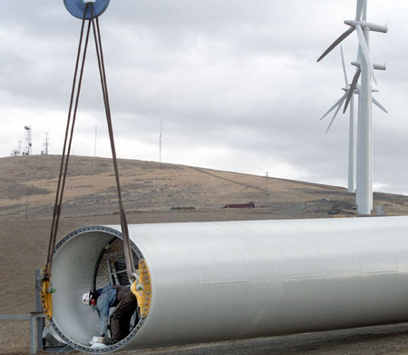 A worker assembles a wind turbine. (AP/Jackie Johnston)