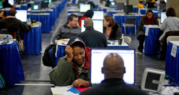 Dmissew Denget of Cold Springs, N.C., meets with a home saver counselor during the Neighborhood Assistance Corporation of America's mortgage modification event in New York. Foreclosure mediation is the last line in foreclosure prevention and the first line of speeding up the foreclosure process for those homeowners who simply cannot make their mortgage payments. (AP/David Goldman)