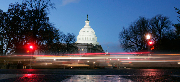 Rush hour traffic on Independence Avenue makes its way past the U.S. Capitol Building. (AP/Pablo Martinez Monsivais)