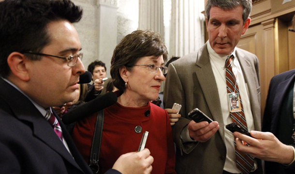 Sen. Susan Collins (R-ME), second from left, talks with the media on Capitol Hill in Washington, Wednesday, December 8, 2010. A small but growing number of Republicans in the Senate, led by Sen. Collins, support repeal of "Don't Ask, Don't Tell." (AP/Alex Brandon)