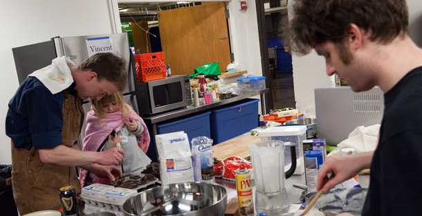 Preparing meals at home can be a family activity, and teaching children how to cook is a skill they’ll use for their entire lives. (Flickr/<a href=