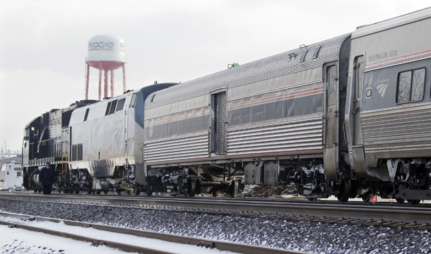 Besides the lowered emissions compared to plane travel, taking a train is often more economical and relaxing than flying. (AP/Mark Duncan)