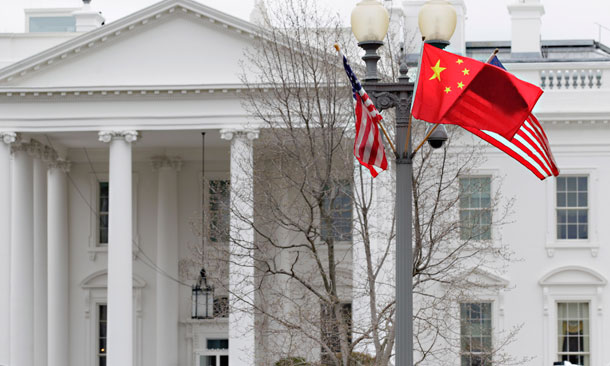 American and Chinese flags fly along Pennsylvania Avenue in front of the White House. On Wednesday, Chinese President Hu Jintao arrives for a state visit. (AP/Carolyn Kaster)
