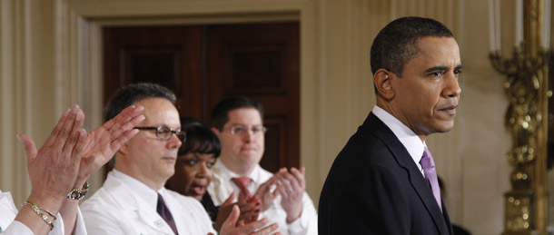 President Barack Obama pauses while speaking about health care reform on March 3, 2010, in the East Room of the White House in Washington. The president needs to remind senators and representatives why the health reform law was necessary in this year’s State of the Union. (AP/Alex Brandon)